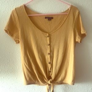 Light yellow blouse with buttons
